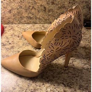 Nude color heel, size 8.5, never worn.